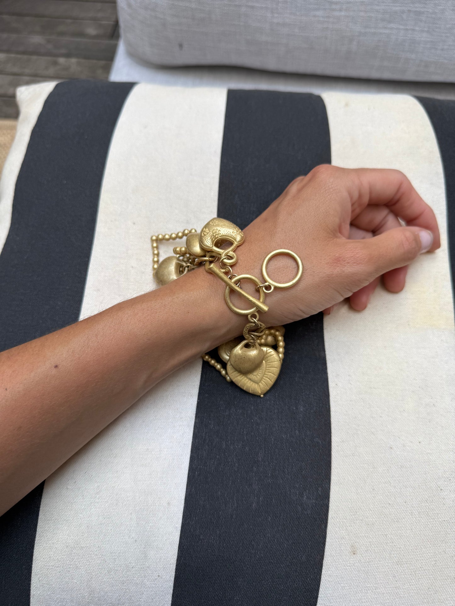 Vintage gold tone hearts charm bracelet