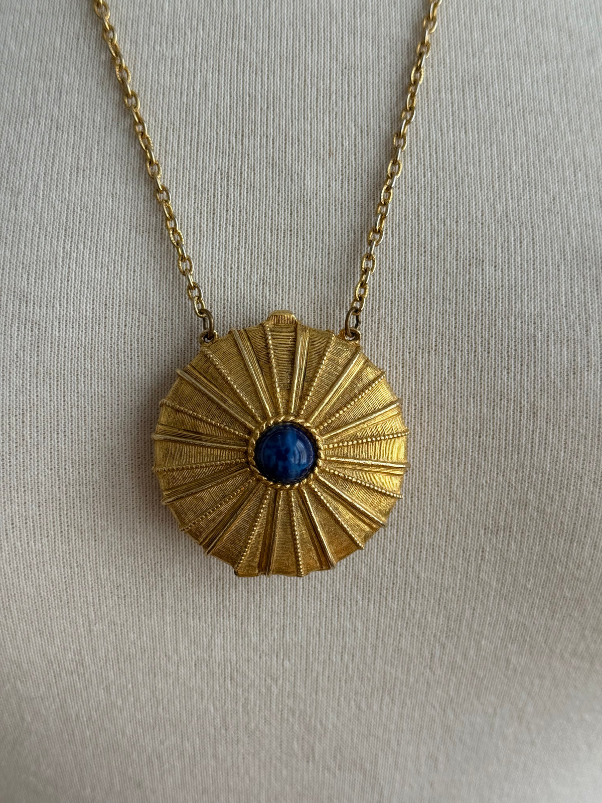 80s Estée Lauder solid perfume locket necklace with  blue lapis lazuli-style stone