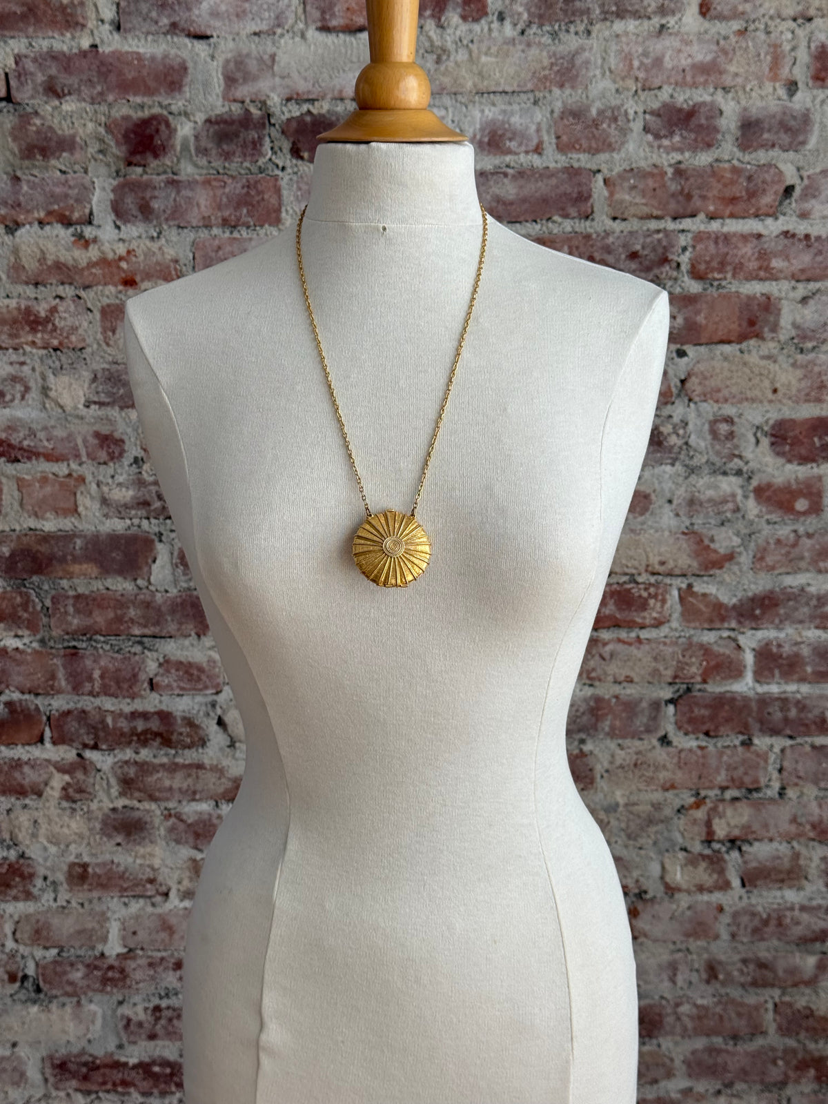 80s Estée Lauder solid perfume locket necklace with  blue lapis lazuli-style stone