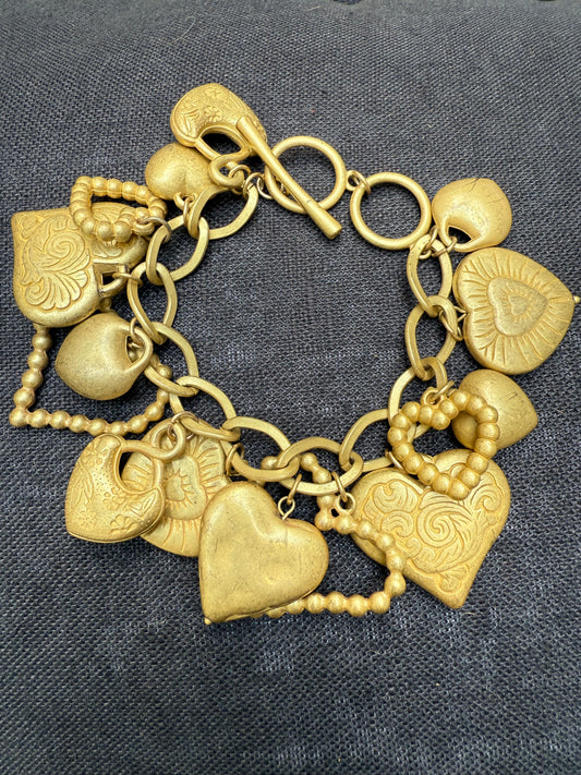 Vintage gold tone hearts charm bracelet