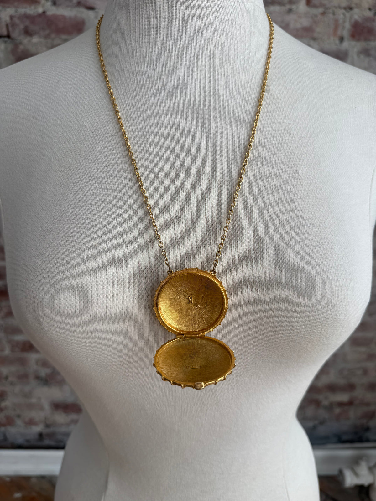 80s Estée Lauder solid perfume locket necklace with  blue lapis lazuli-style stone